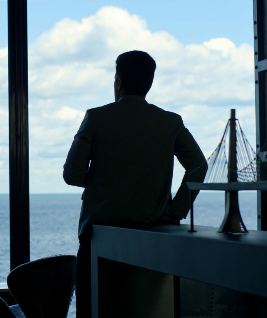 man silhouette enjoying break in conference room 2022 12 30 02 15 10 utc min e1698293863890 for public records research